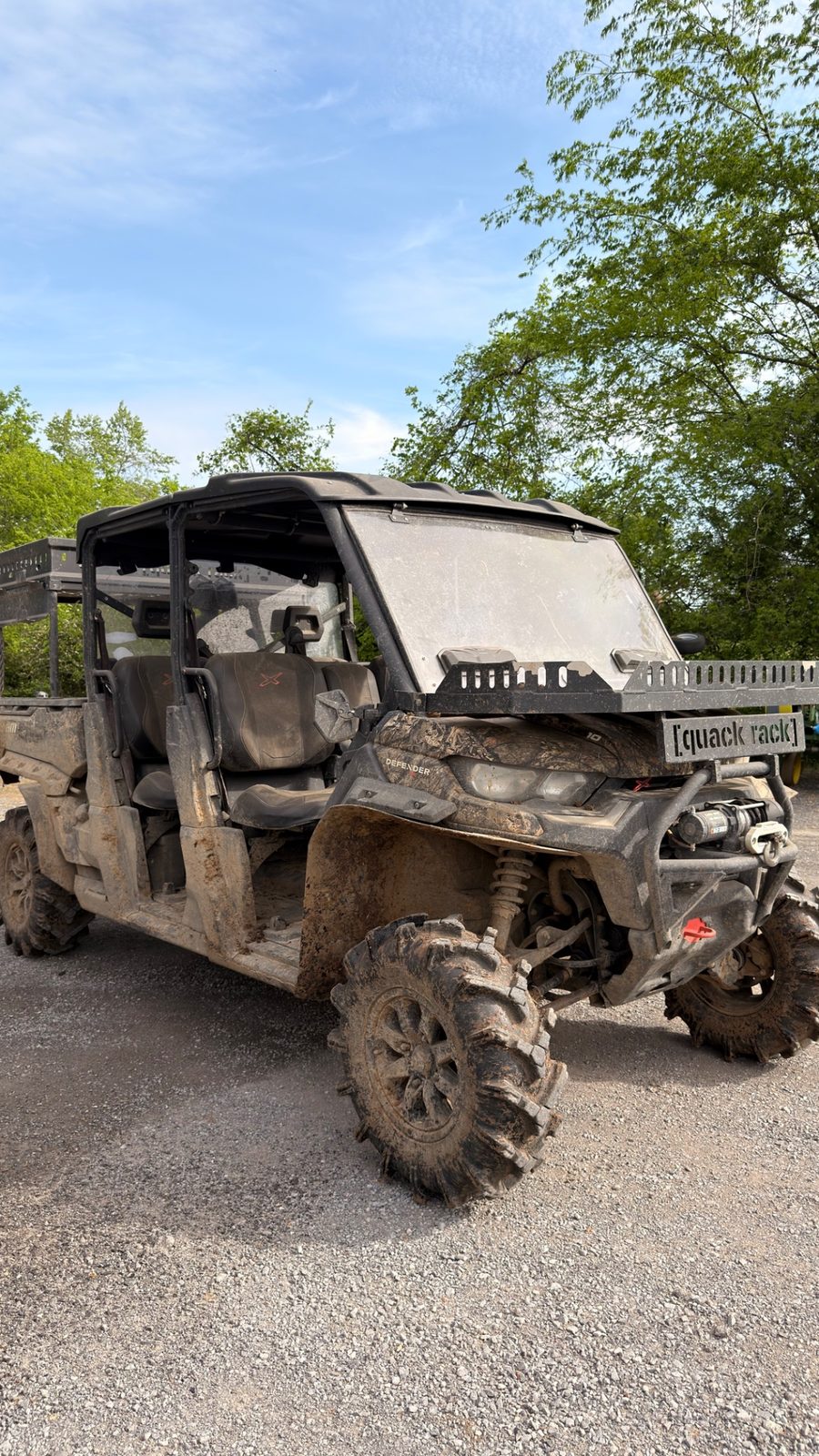 Can-Am Defender UTV caked in mud before detailing