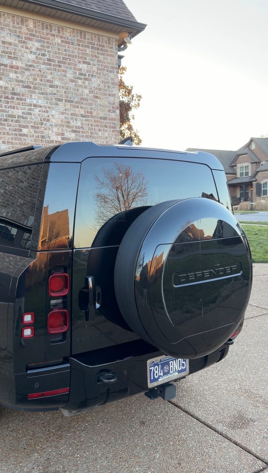 Land Rover Defender rear exterior after detailing — deep restored gloss