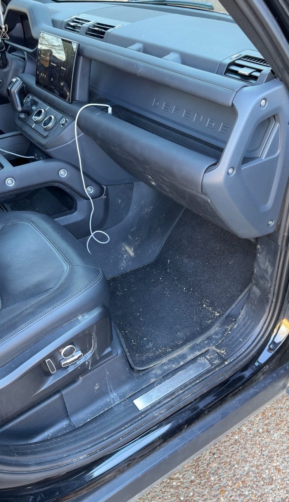 Land Rover Defender interior dirty seats and surfaces before detailing
