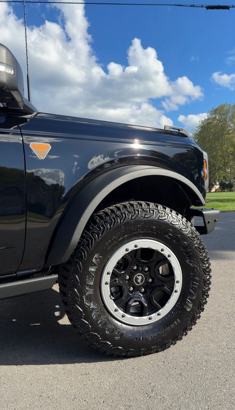 Black Ford Bronco with freshly detailed wheels and tires