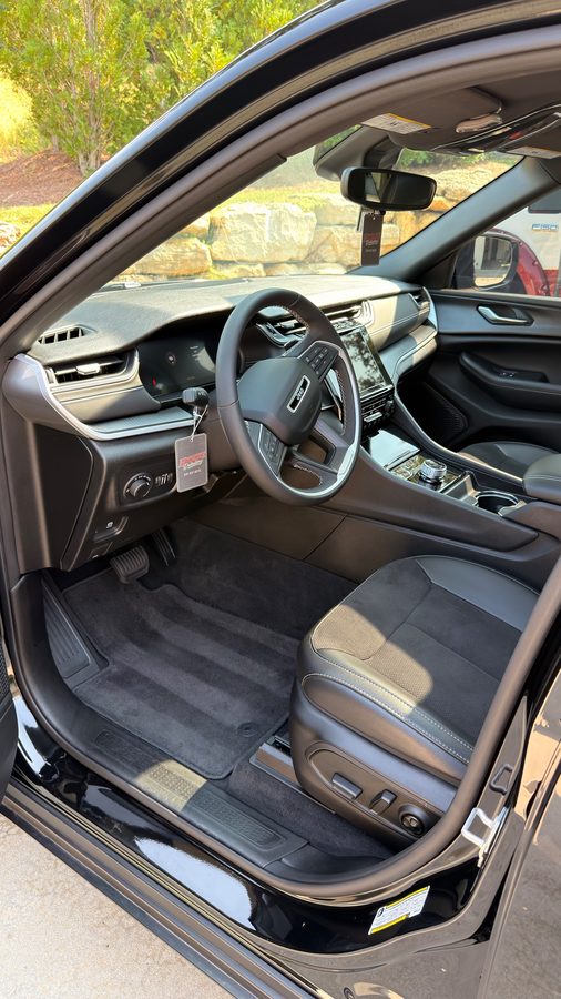 Freshly detailed Jeep Grand Cherokee interior with a Hitchcock Detailing tag